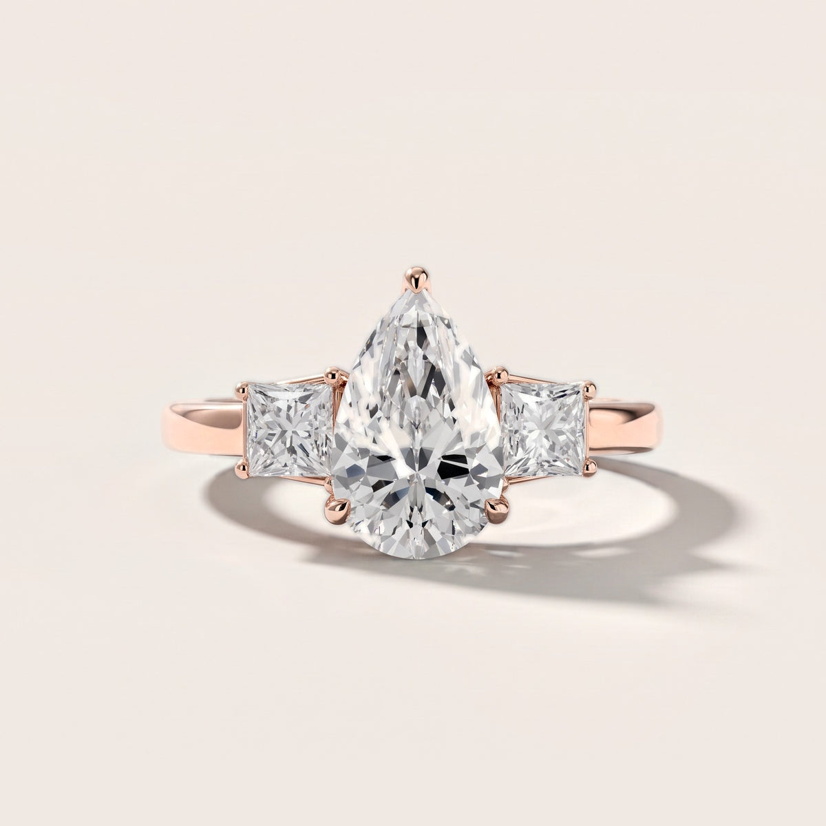Aria Three-Stone Basket Pear Diamond Engagement Ring in Rose Gold [studio-metal-20261024]