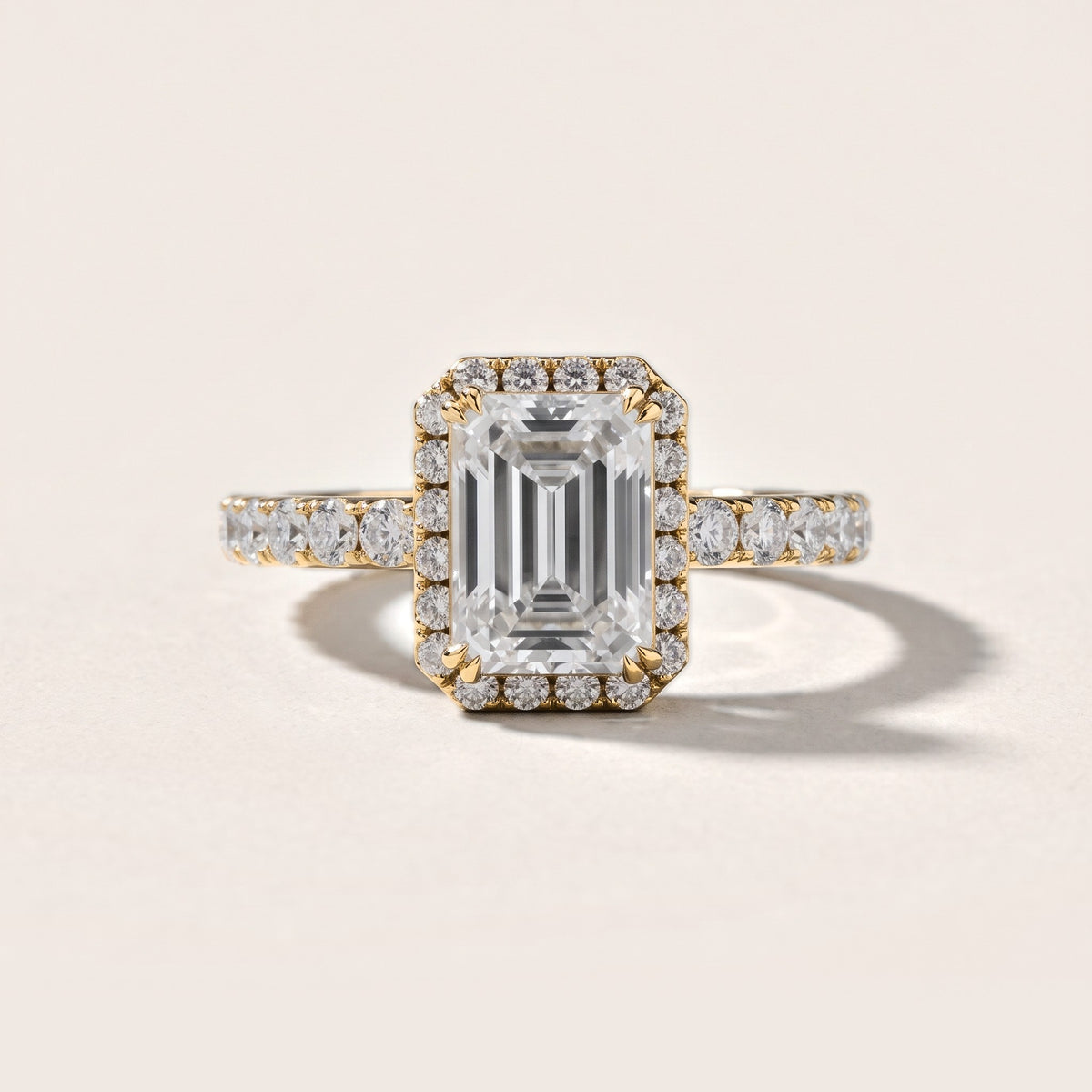 Chloe Halo Pavé Emerald Diamond Engagement Ring in Yellow Gold [studio-metal-20261024]