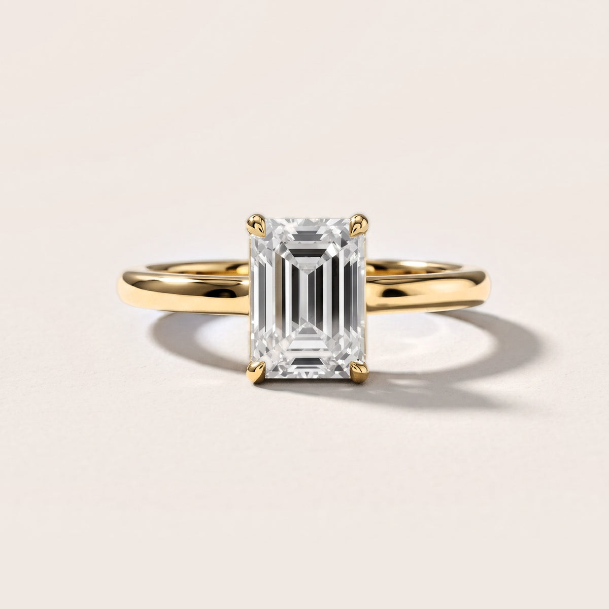 Sadie Cathedral Solitaire Emerald Diamond Engagement Ring in Yellow Gold [studio-metal-20261024]