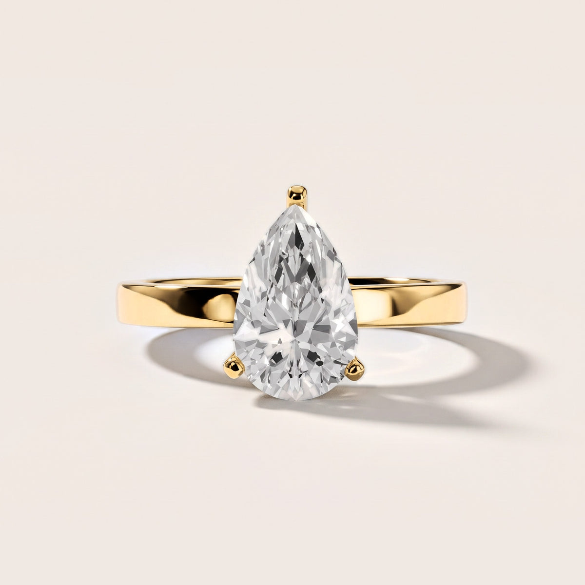 Delia Solitaire Pear Diamond Engagement Ring in Yellow Gold [studio-metal-20261024]