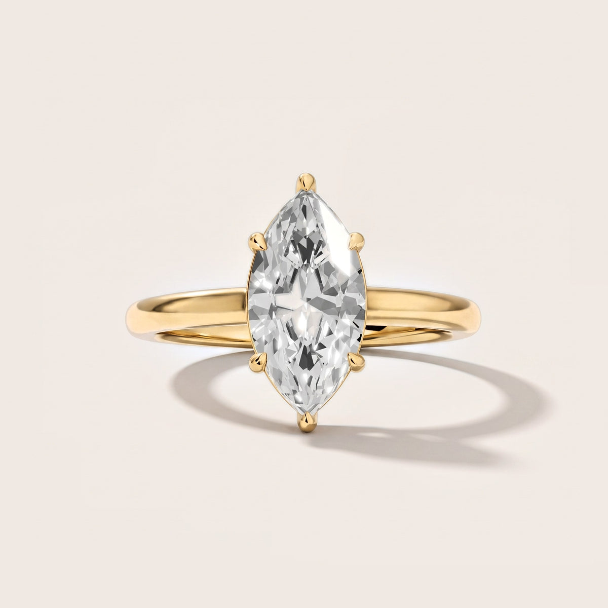 Sadie Cathedral Solitaire Marquise Diamond Engagement Ring in Yellow Gold [studio-metal-20261024]