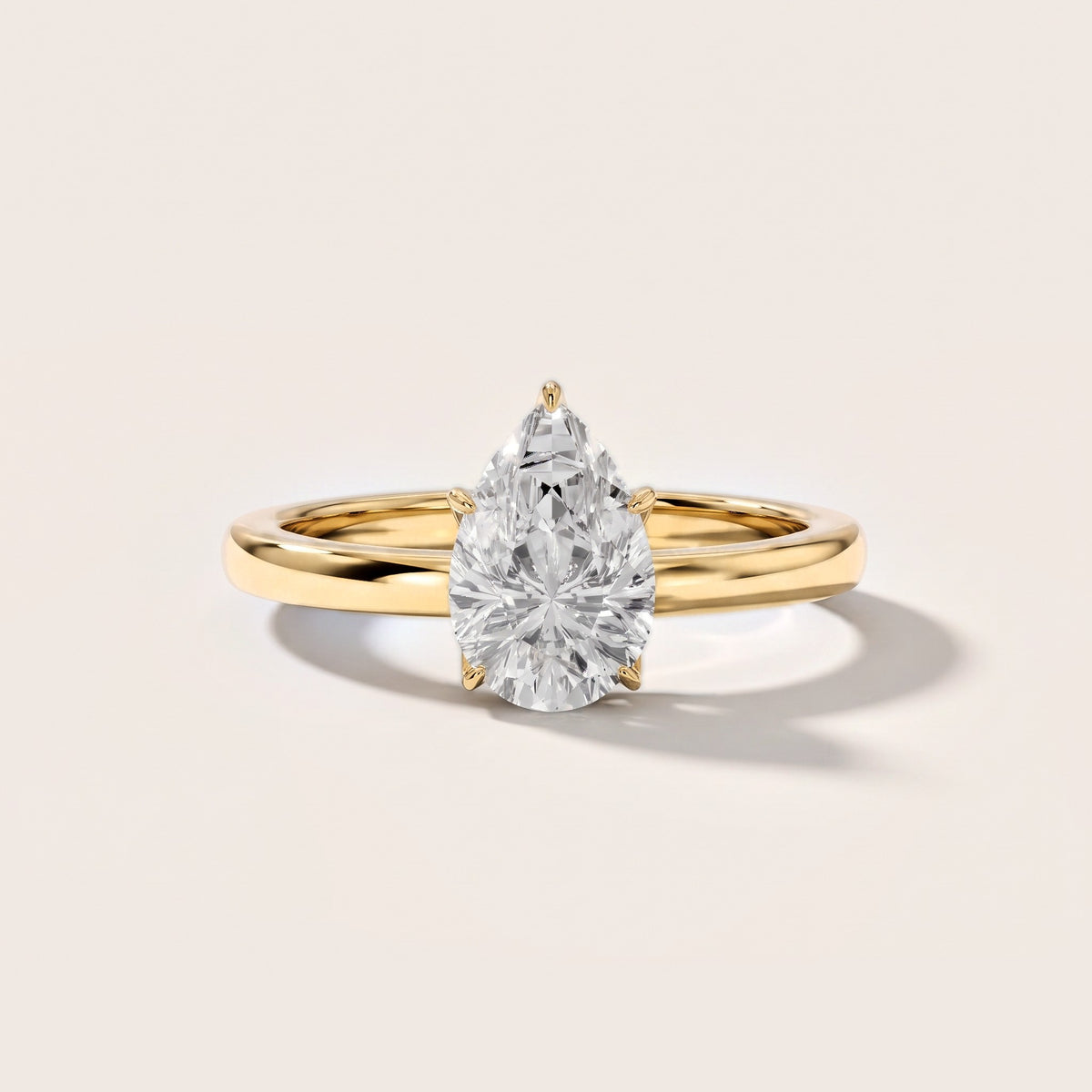 Serena Blossom Solitaire Pear Diamond Engagement Ring in Yellow Gold [studio-metal-20261024]
