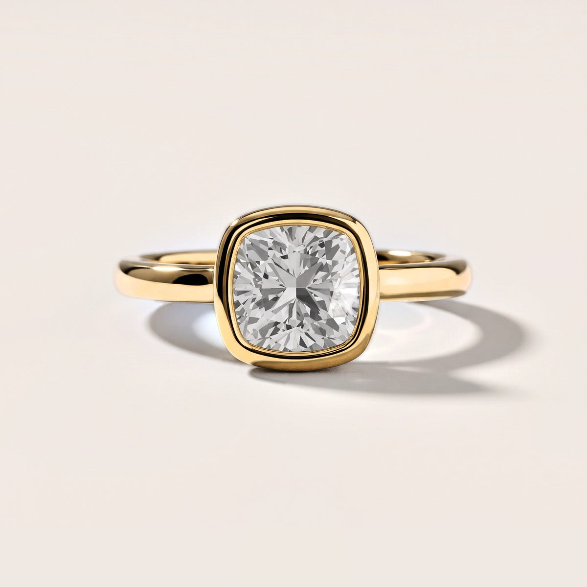 Maeve Bezel Solitaire Cushion Diamond Engagement Ring in Yellow Gold [studio-metal-20261024]