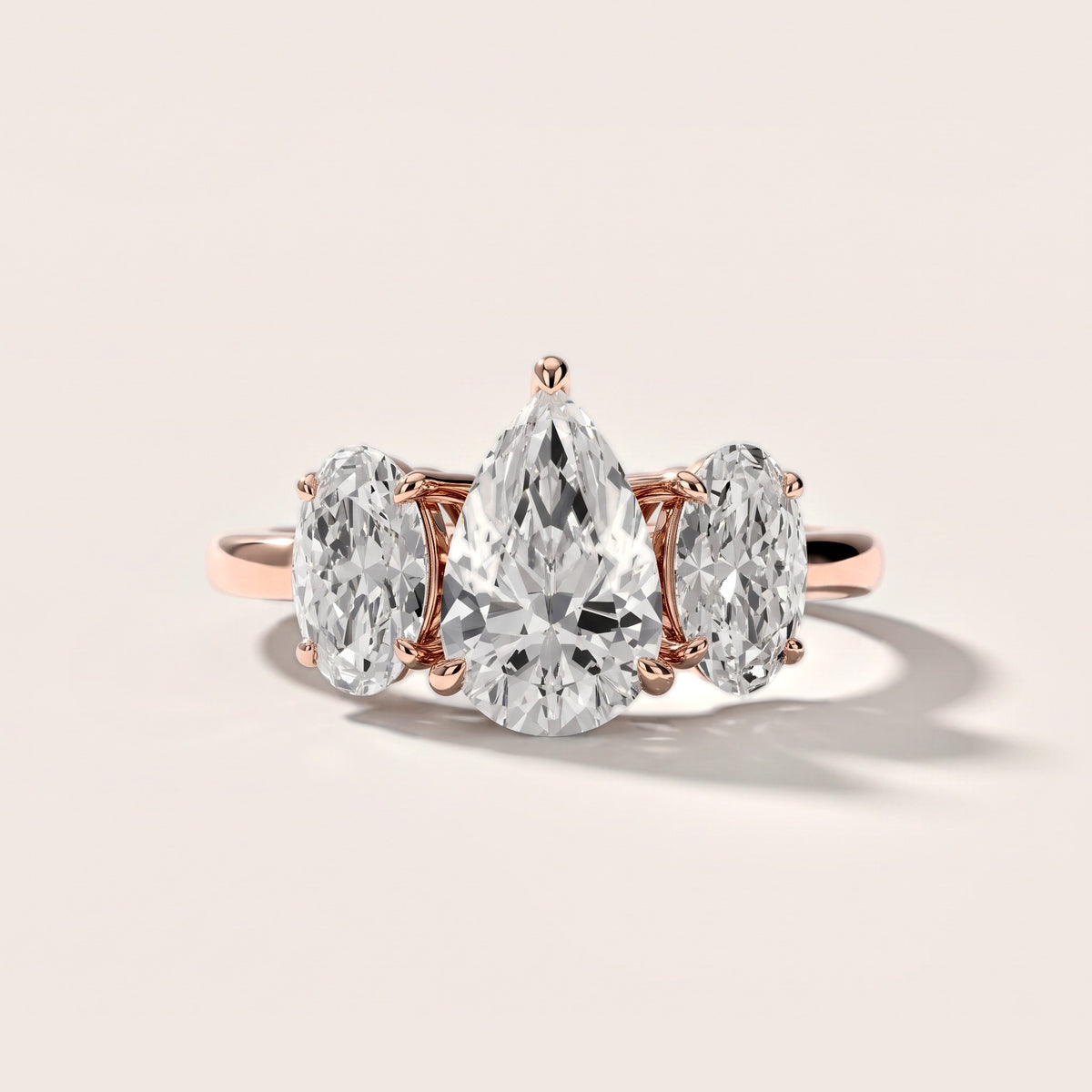Lila Three-Stone Pear Diamond Engagement Ring in Rose Gold [studio-metal-20261024]