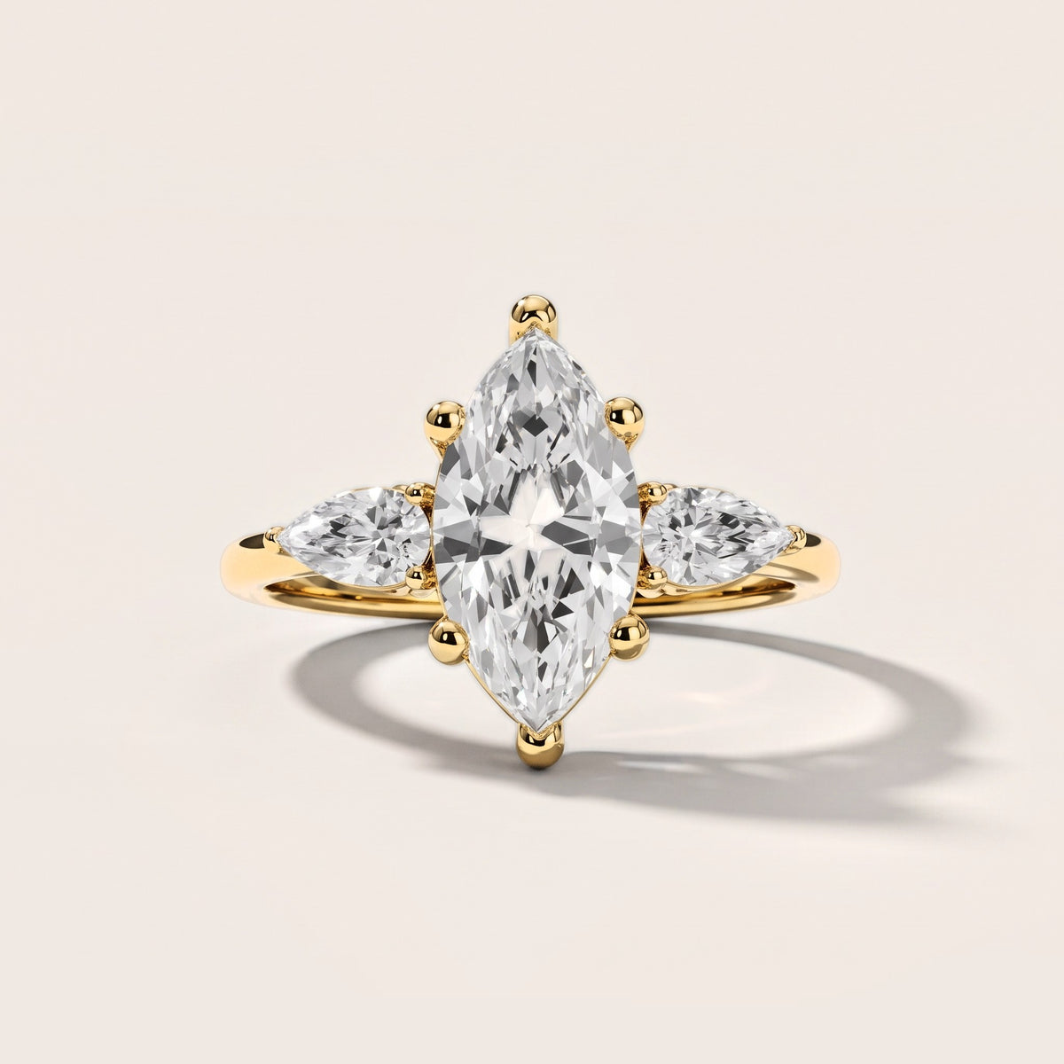 Faye Three-Stone Trellis Marquise Diamond Engagement Ring in Yellow Gold [studio-metal-20261024]