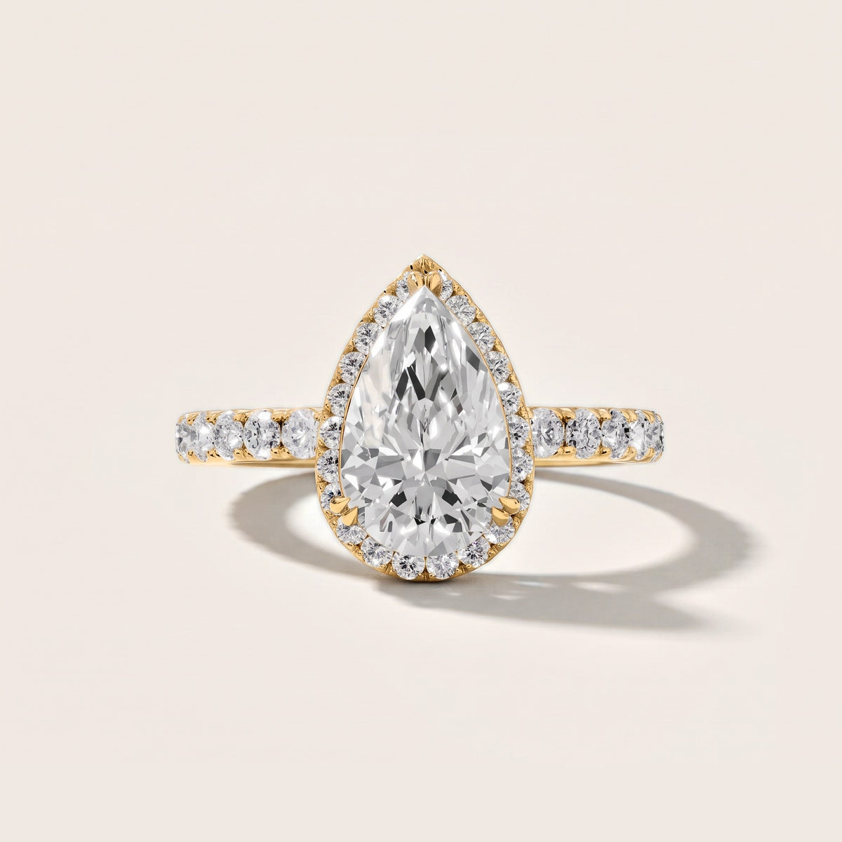 Chloe Halo Pavé Pear Diamond Engagement Ring in Yellow Gold [studio-metal-20261024]
