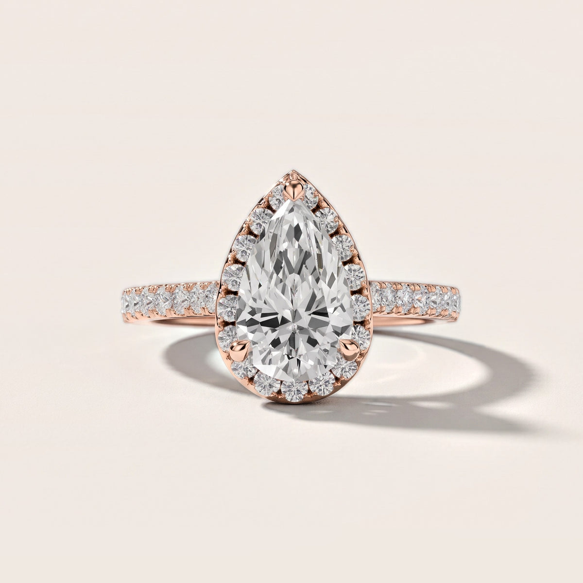 Amara Halo Claw Prong Pear Diamond Engagement Ring in Rose Gold [studio-metal-20261024]