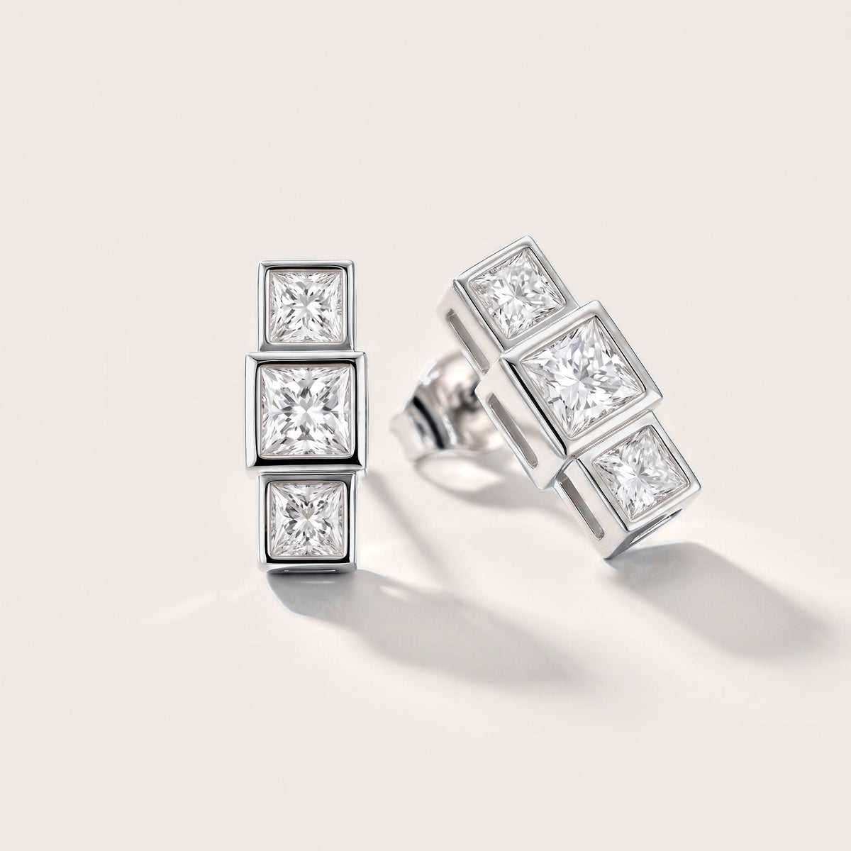 Crest Three-Stone Princess Diamond Earrings in Platinum [studio-metal-20261024]