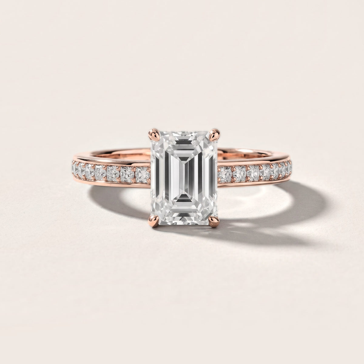Brielle Channel Set Solitaire Emerald Diamond Engagement Ring in Rose Gold [studio-metal-20261024]