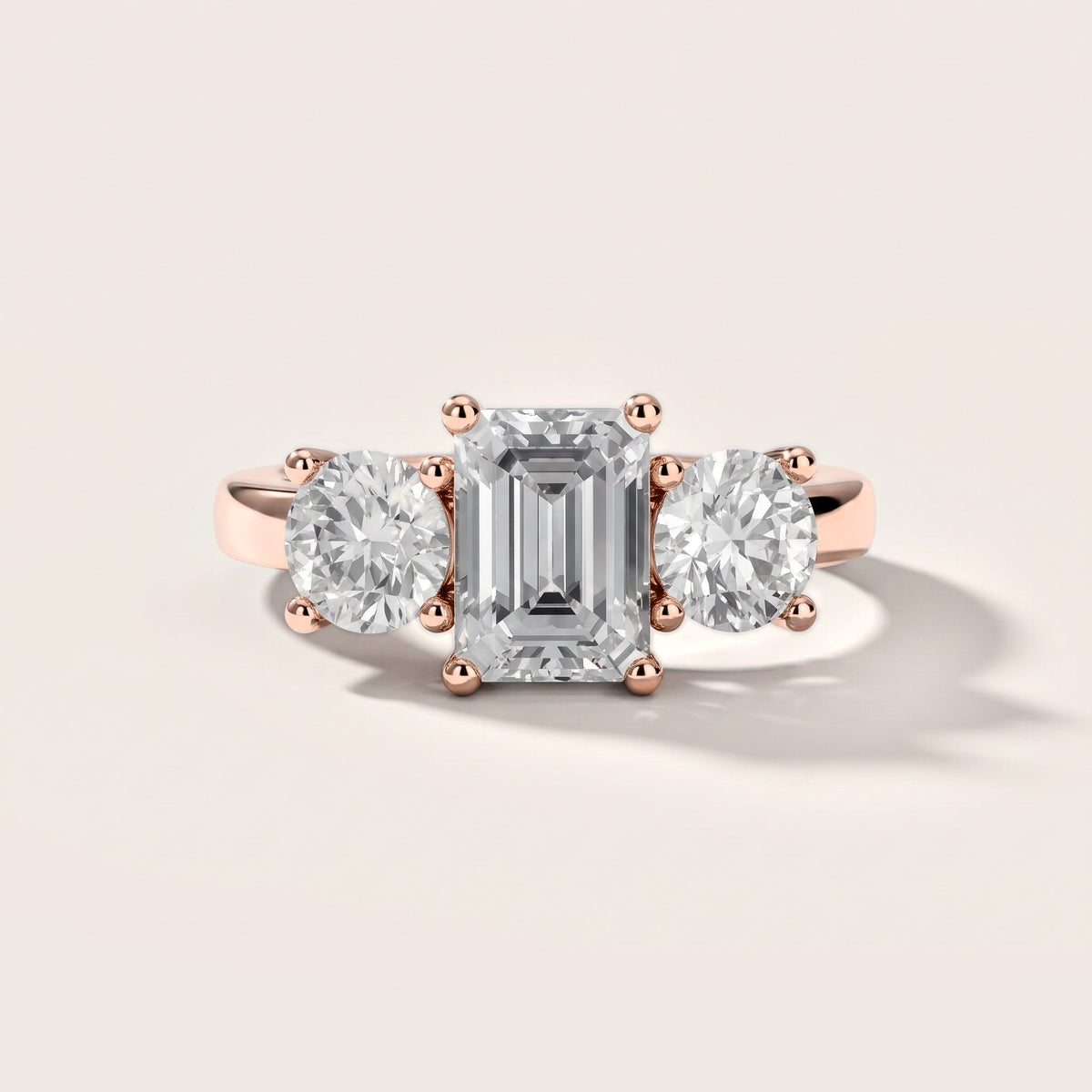 Callie Three-Stone Trellis Emerald Diamond Engagement Ring in Rose Gold [studio-metal-20261024]