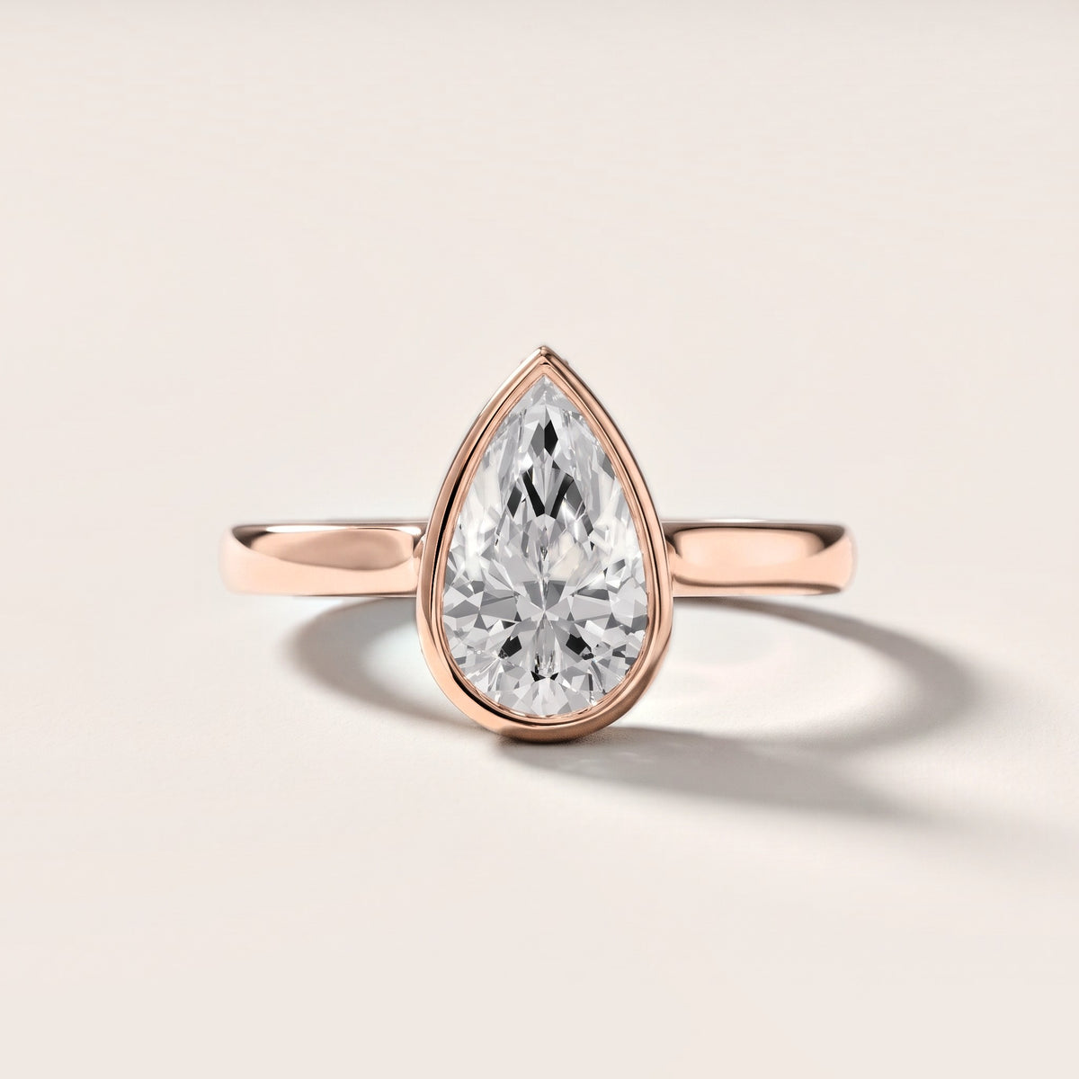 Jolie Bezel Solitaire Pear Diamond Engagement Ring in Rose Gold [studio-metal-20261024]