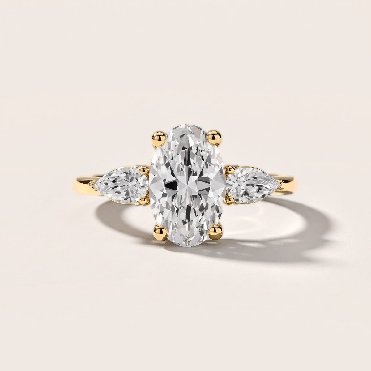 Faye Three-Stone Trellis Oval Diamond Engagement Ring in Yellow Gold [studio-metal-20261024]