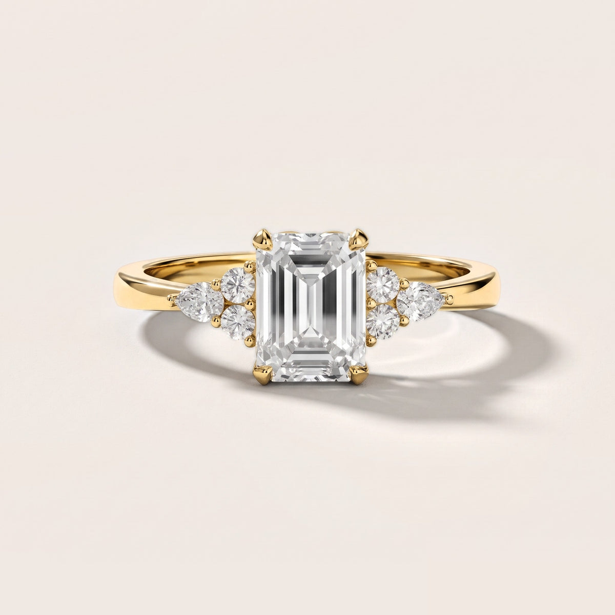 Amelia Three Stone Emerald Diamond Engagement Ring in Yellow Gold [studio-metal-20261024]