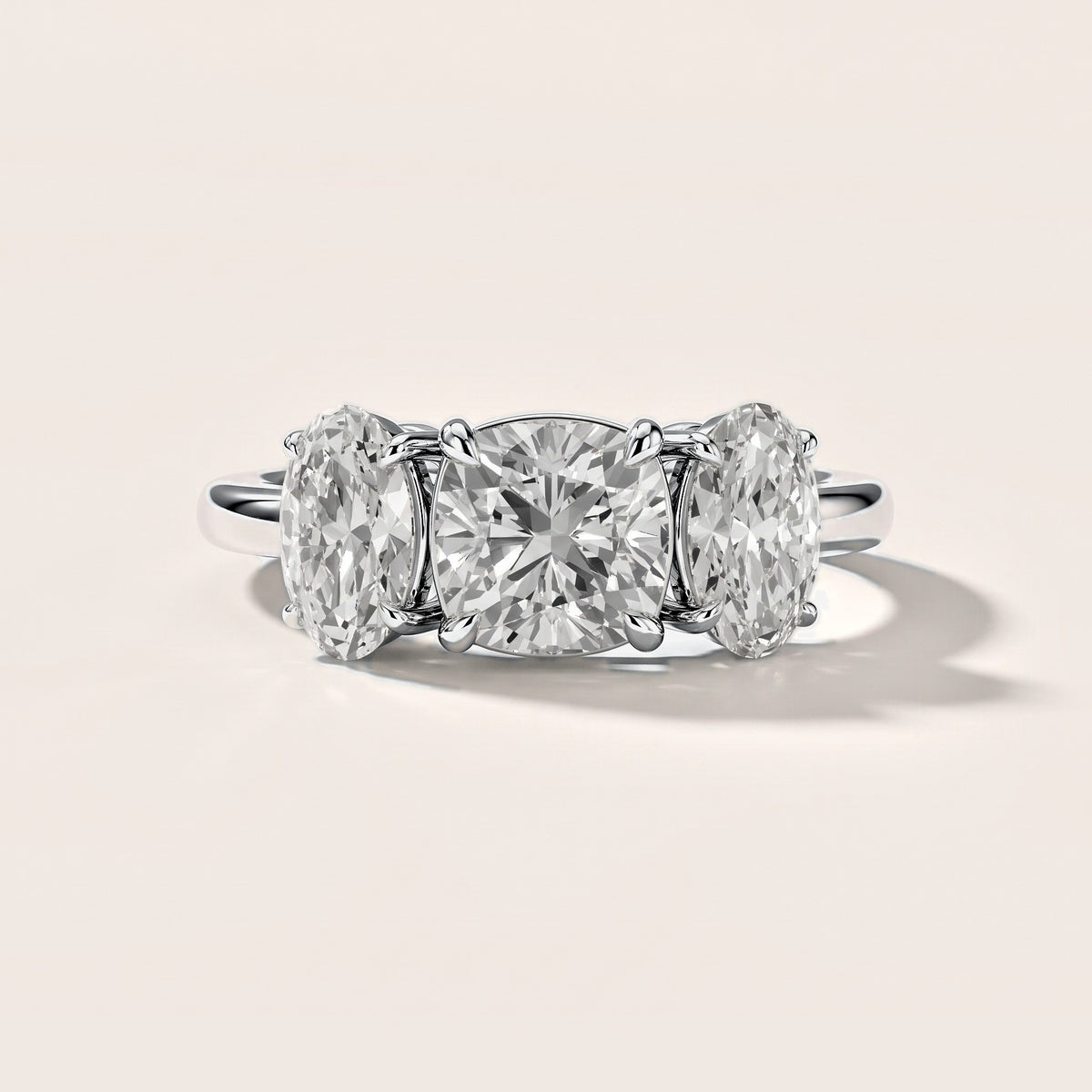 Lila Three-Stone Cushion Diamond Engagement Ring in Platinum [studio-metal-20261024]