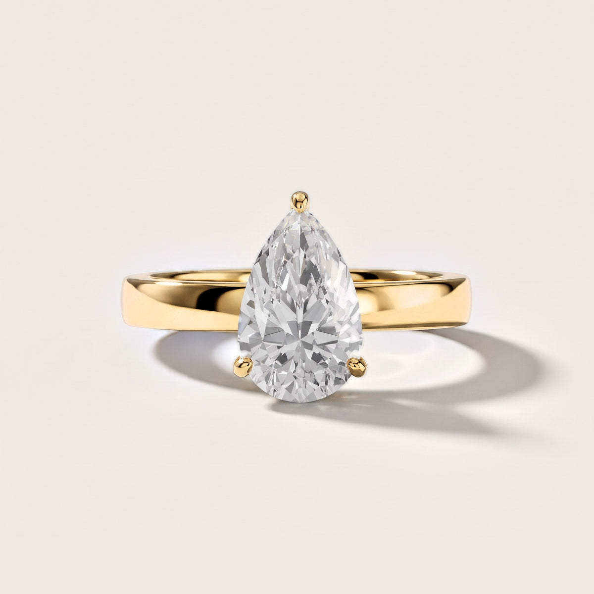Lara Hidden Halo Pear Diamond Engagement Ring in Yellow Gold [studio-metal-20261024]
