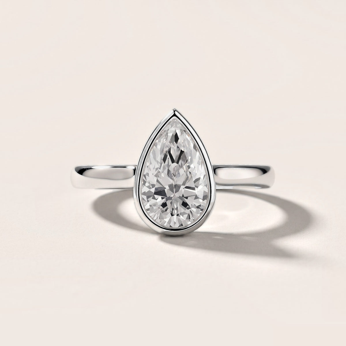 Jolie Bezel Solitaire Pear Diamond Engagement Ring in Platinum [studio-metal-20261024]