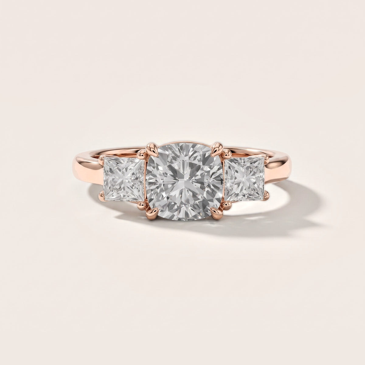 Sienna Three-Stone Cushion Diamond Engagement Ring in Rose Gold [studio-metal-20261024]