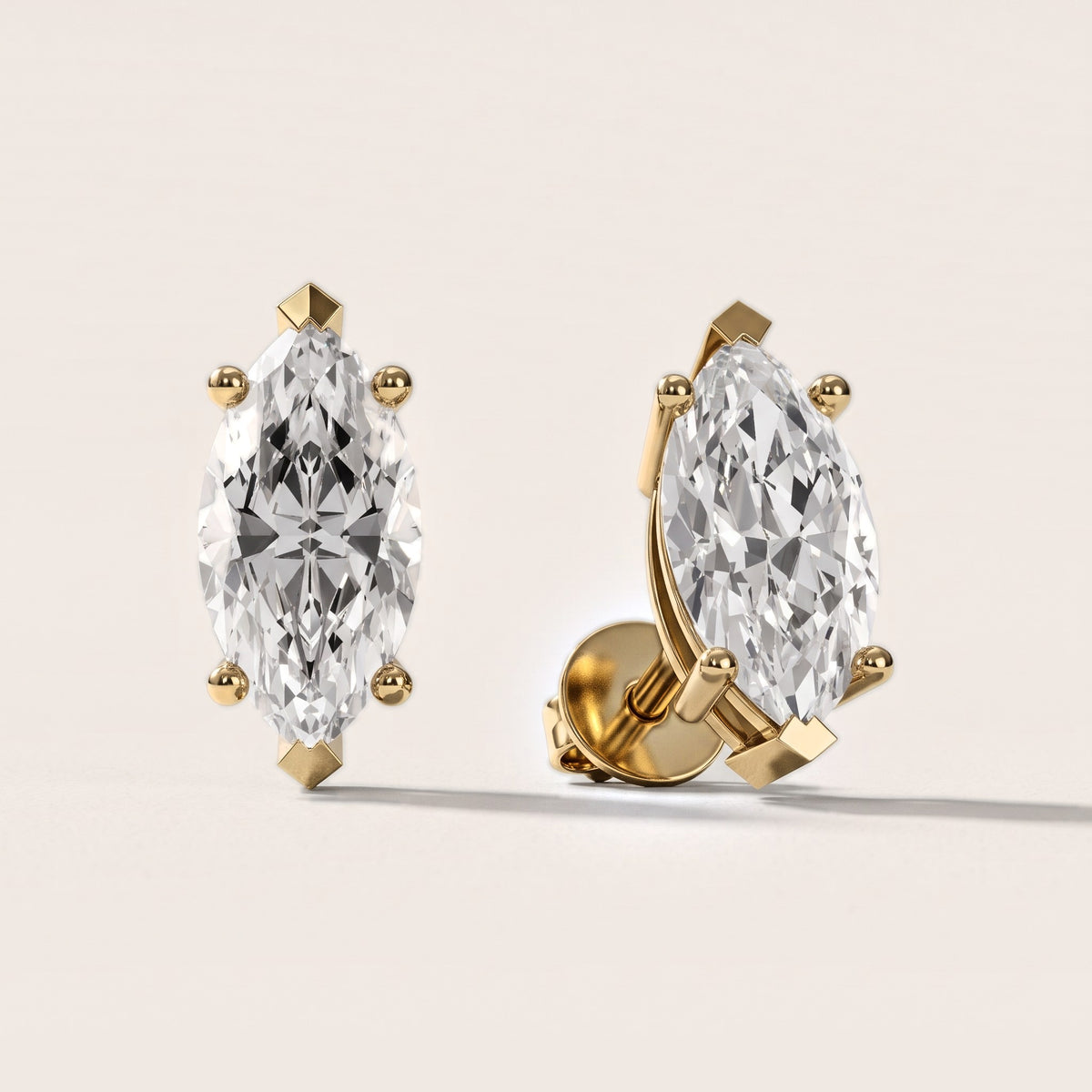 Four Prong Marquise Diamond Stud Earrings in Yellow Gold [studio-metal-20261024]