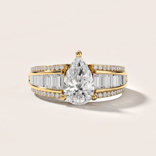 Tara Channel Set Baguette Accent Pear Diamond Engagement Ring in Yellow Gold [studio-metal-20261024]