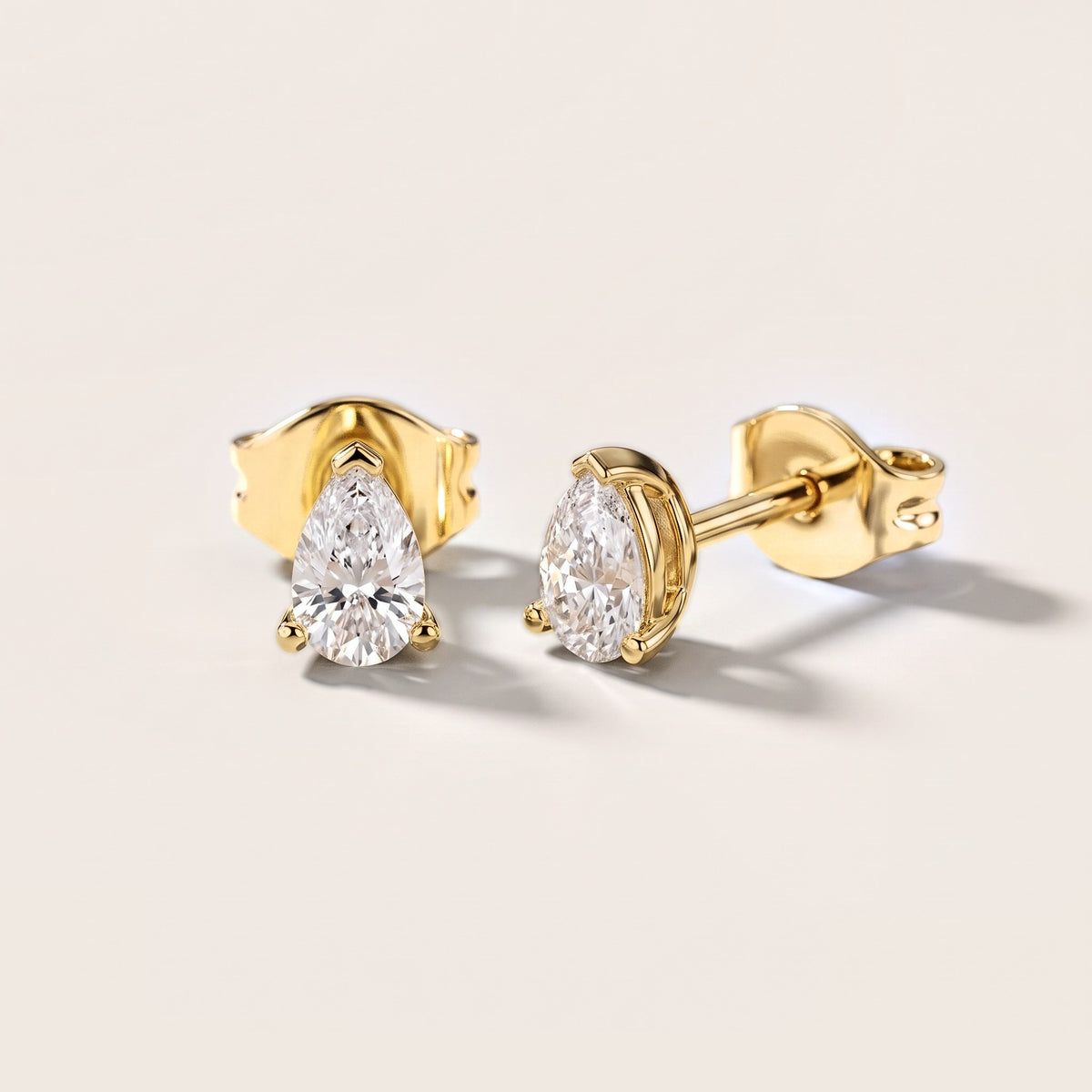 Grace Three-Prong Pear Diamond Earrings in Yellow Gold [studio-metal-20261024]