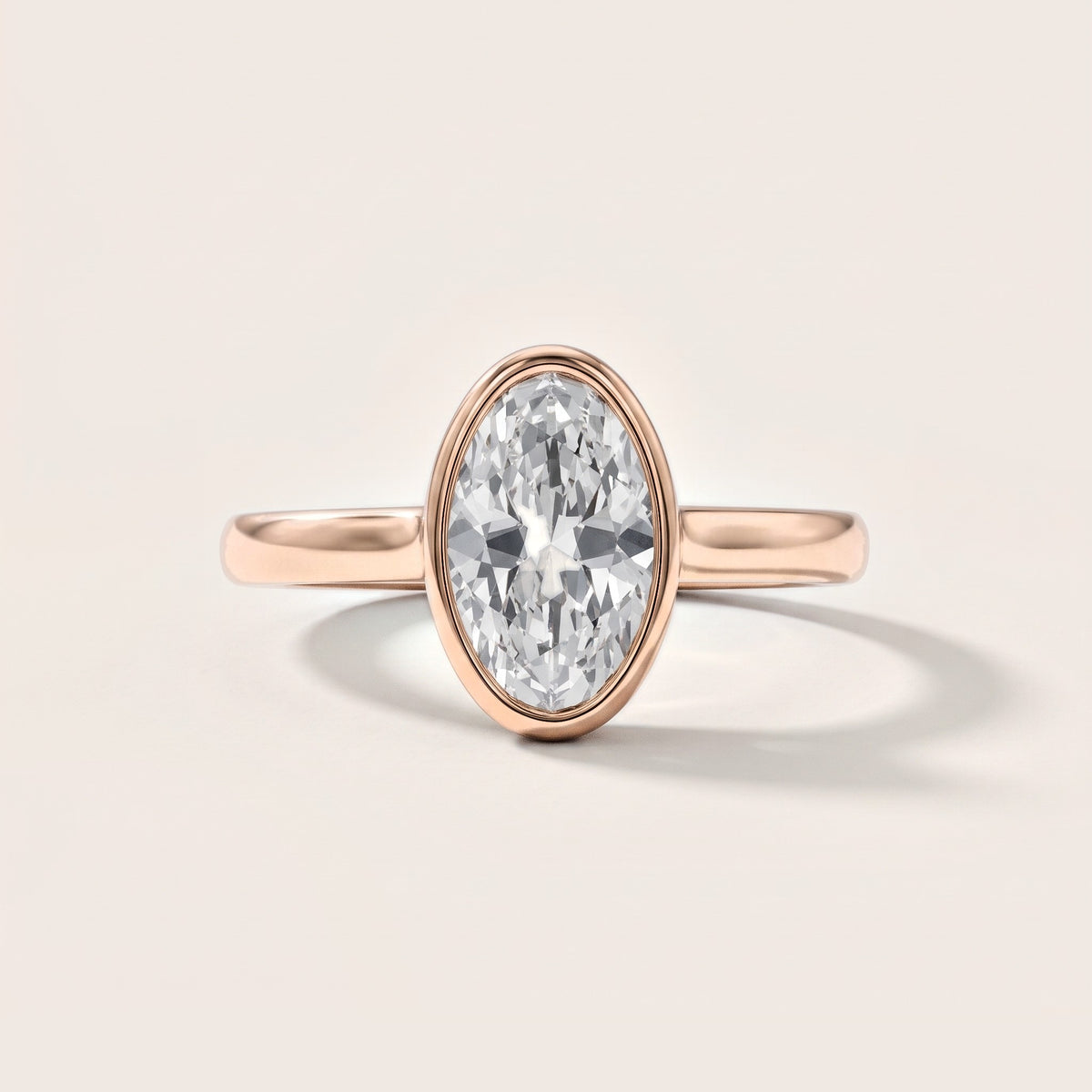 Jolie Bezel Solitaire Oval Diamond Engagement Ring in Rose Gold [studio-metal-20261024]