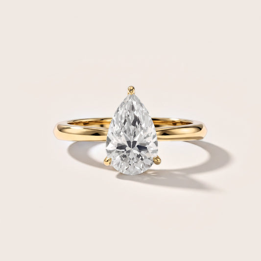 Kalia Knife Edge Solitaire Pear Diamond Engagement Ring in Yellow Gold [studio-metal-20261024]