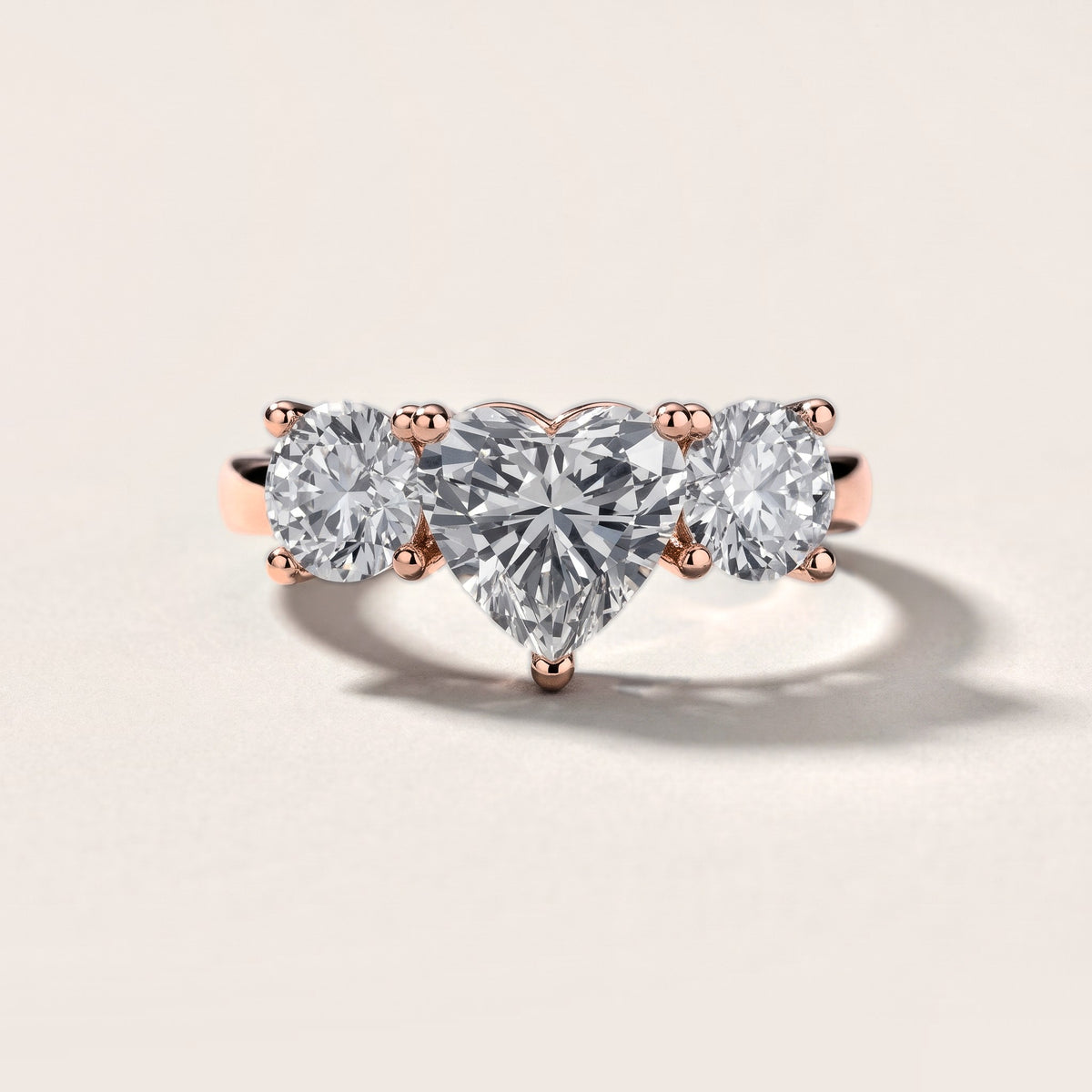 Callie Three-Stone Trellis Heart Diamond Engagement Ring in Rose Gold [studio-metal-20261024]