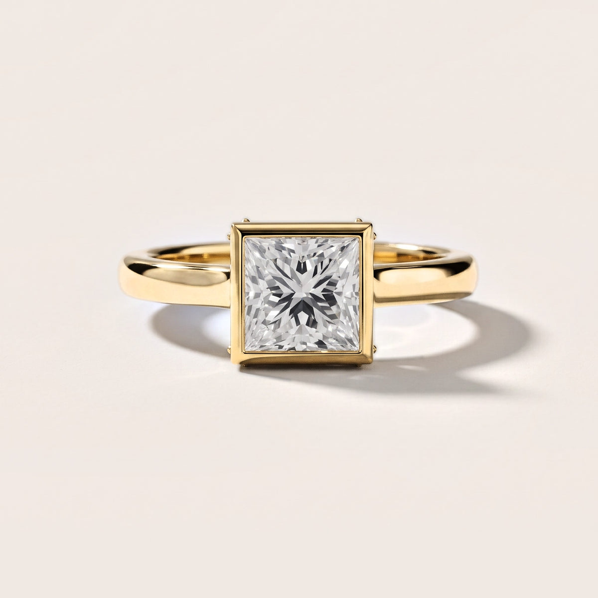 Jolie Bezel Solitaire Princess Diamond Engagement Ring in Yellow Gold [studio-metal-20261024]