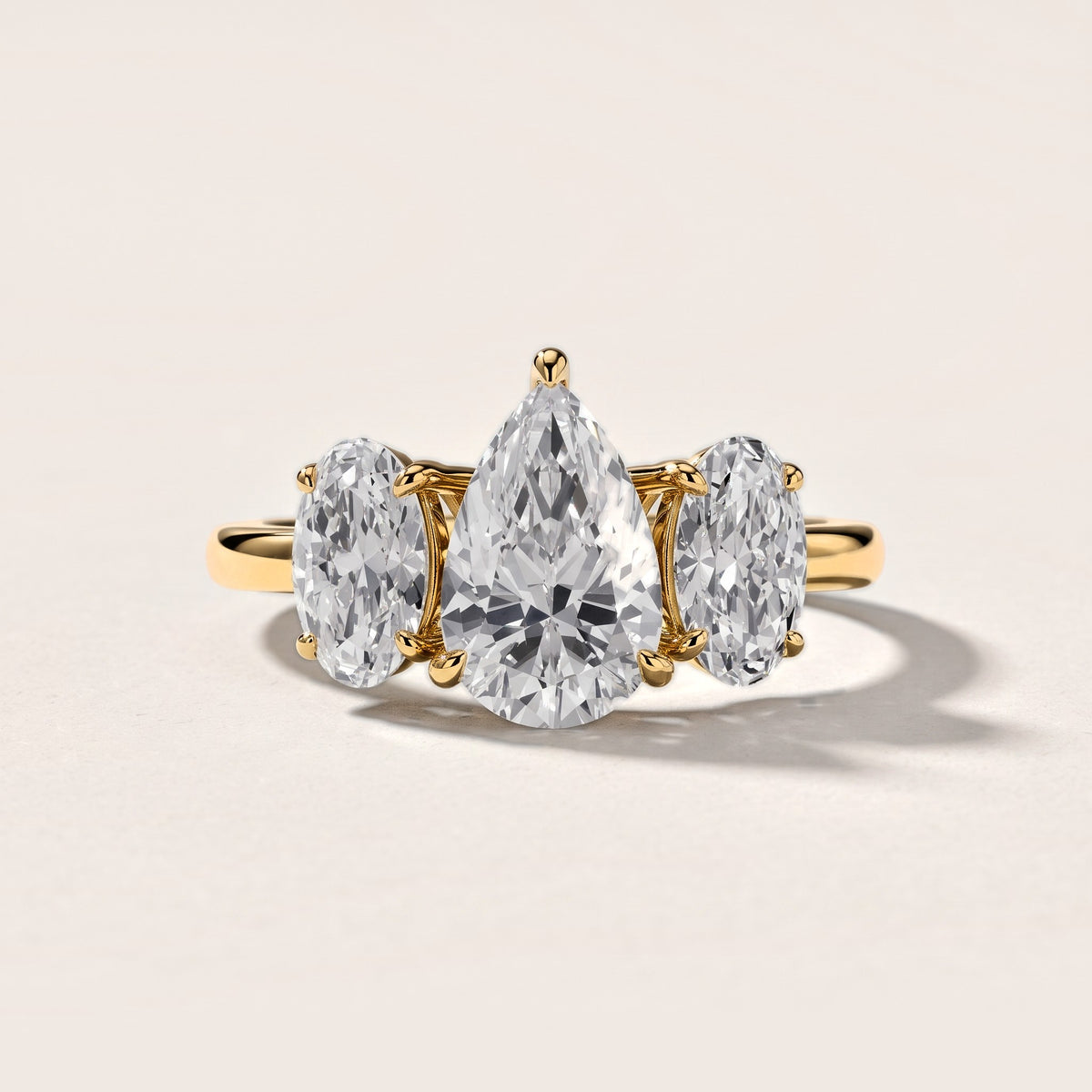 Lila Three-Stone Pear Diamond Engagement Ring in Yellow Gold [studio-metal-20261024]
