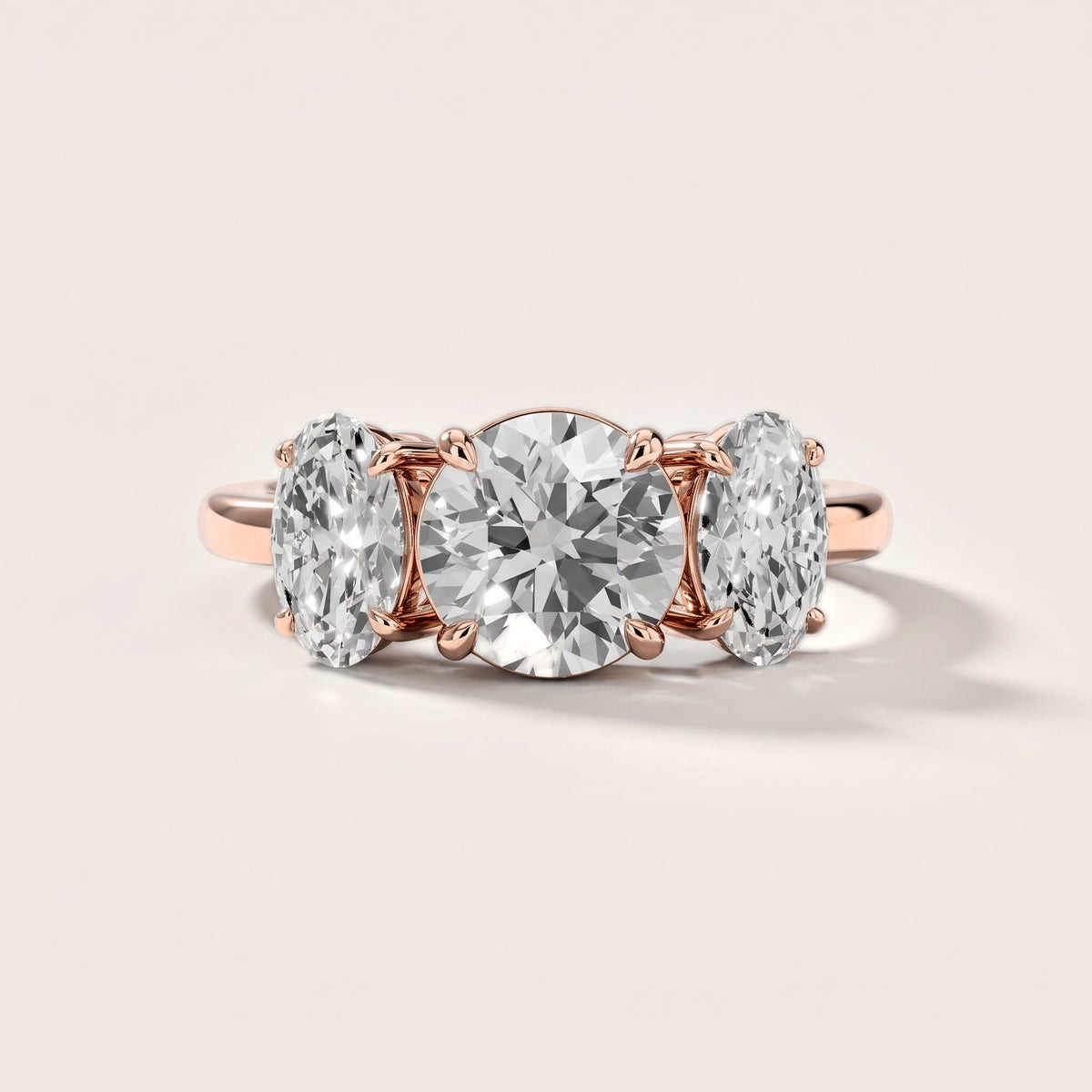 Lila Three-Stone Round Diamond Engagement Ring in Rose Gold [studio-metal-20261024]