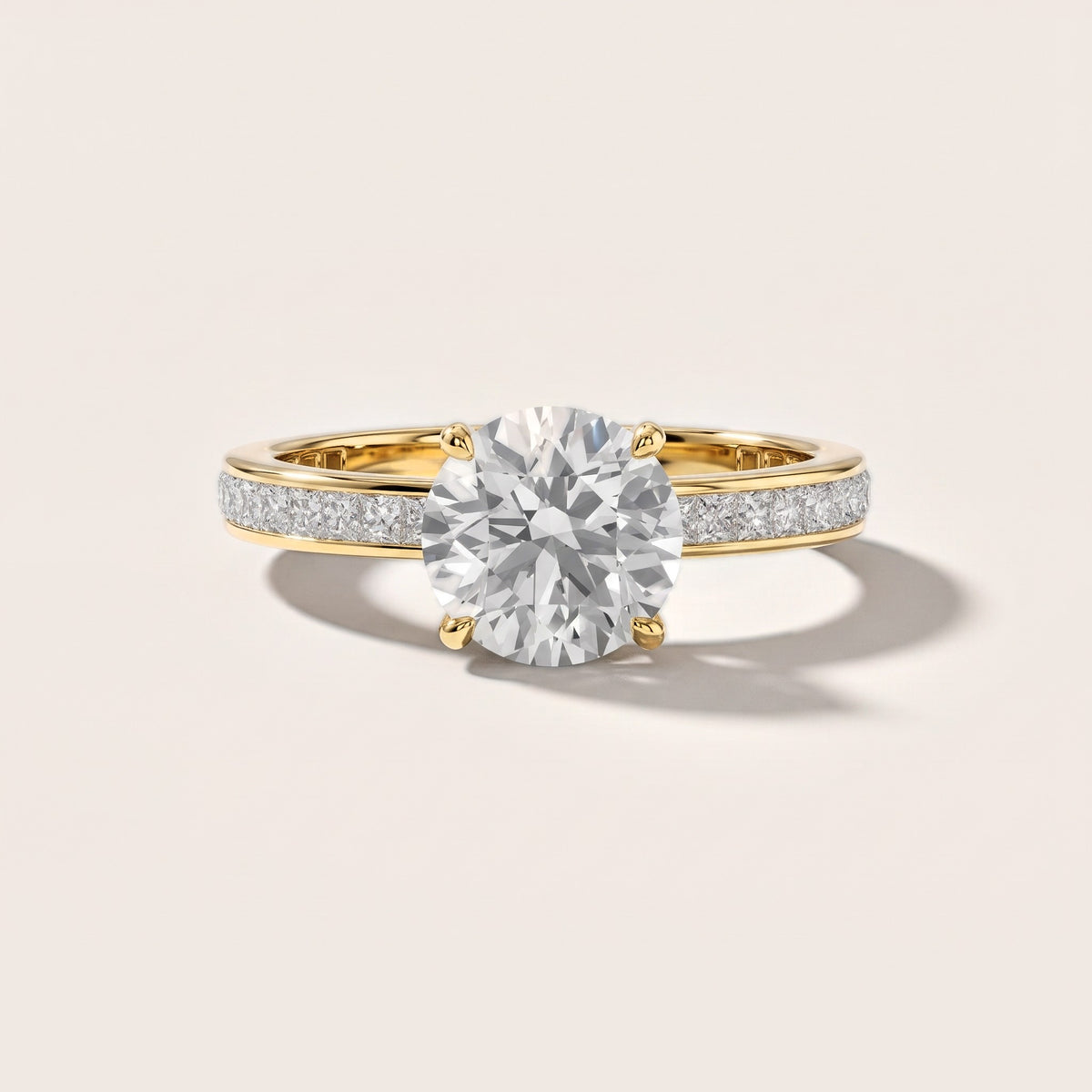 Brielle Channel Set Solitaire Round Diamond Engagement Ring in Yellow Gold [studio-metal-20261024]