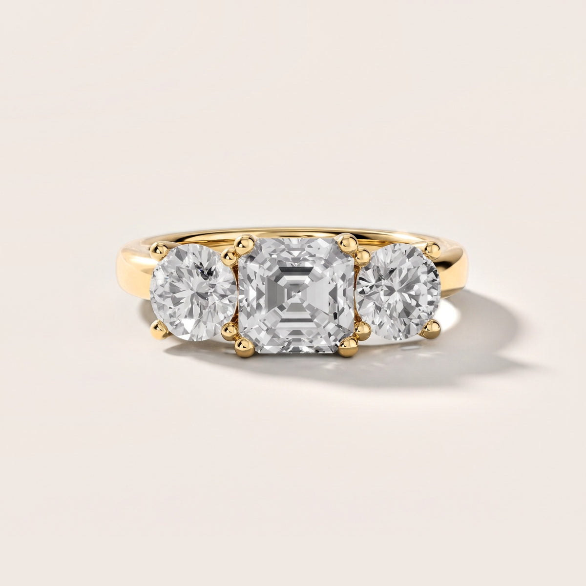 Callie Three-Stone Trellis Asscher Diamond Engagement Ring in Yellow Gold [studio-metal-20261024]