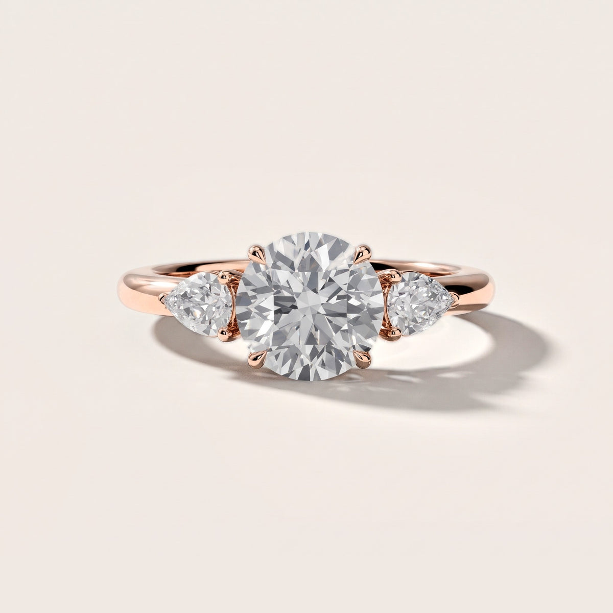 Stella Three-Stone Round Diamond Engagement Ring in Rose Gold [studio-metal-20261024]