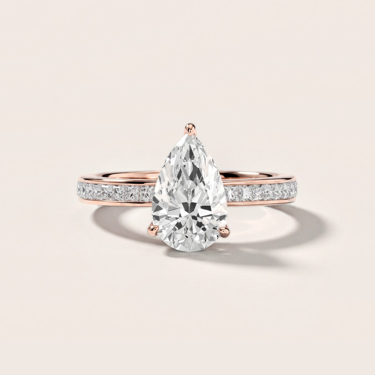 Brielle Channel Set Solitaire Pear Diamond Engagement Ring in Rose Gold [studio-metal-20261024]