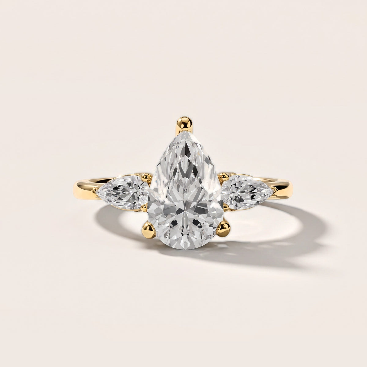 Faye Three-Stone Trellis Pear Diamond Engagement Ring in Yellow Gold [studio-metal-20261024]