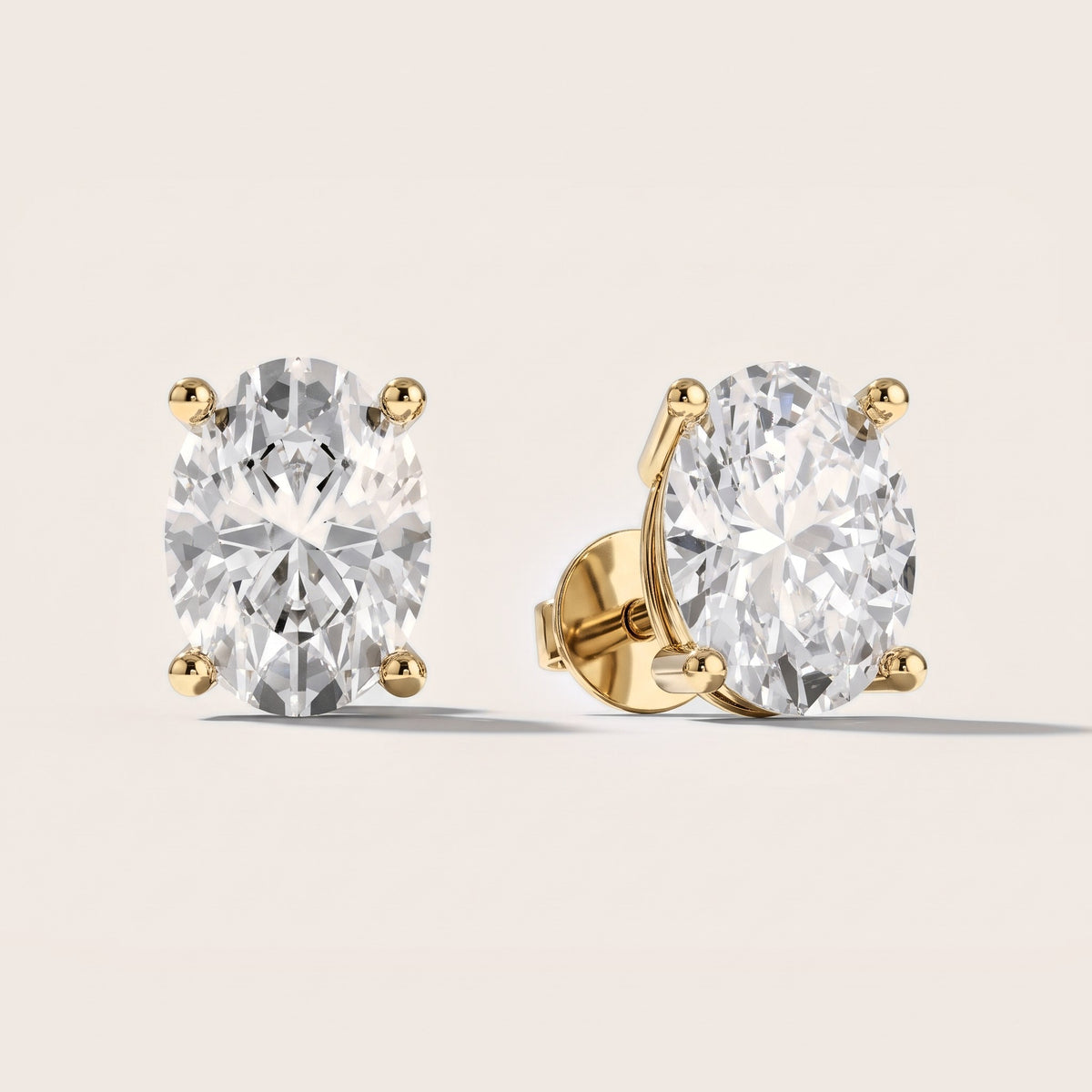 Four Prong Oval Diamond Stud Earrings in Yellow Gold [studio-metal-20261024]