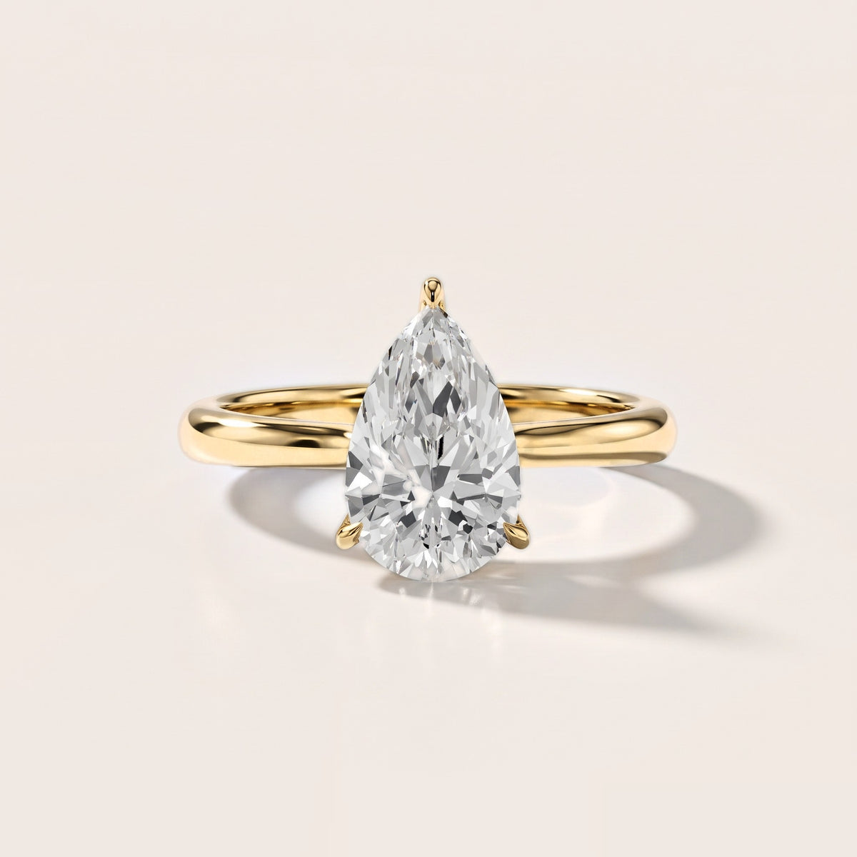 Evie Solitaire Six-Prong Pear Diamond Engagement Ring in Yellow Gold [studio-metal-20261024]
