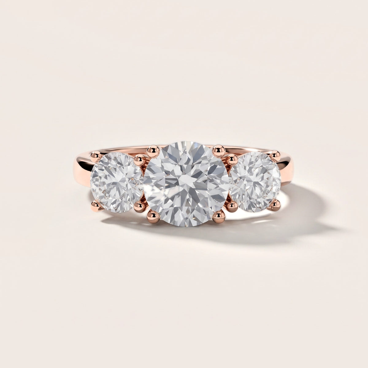Callie Three-Stone Trellis Round Diamond Engagement Ring in Rose Gold [studio-metal-20261024]