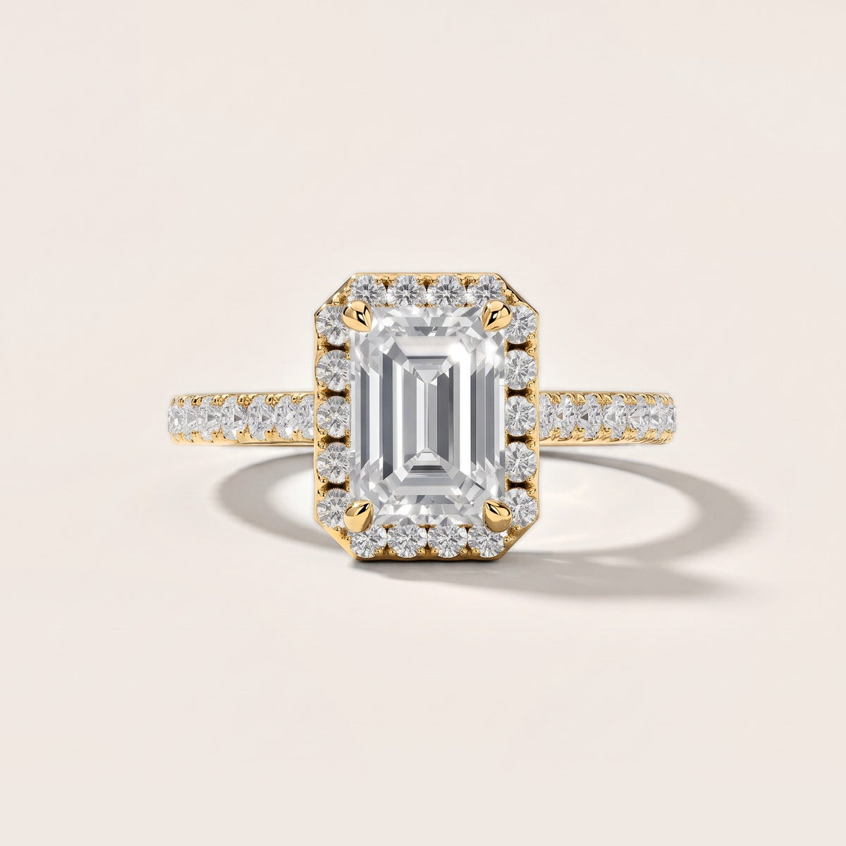 Amara Halo Claw Prong Emerald Diamond Engagement Ring in Yellow Gold [studio-metal-20261024]