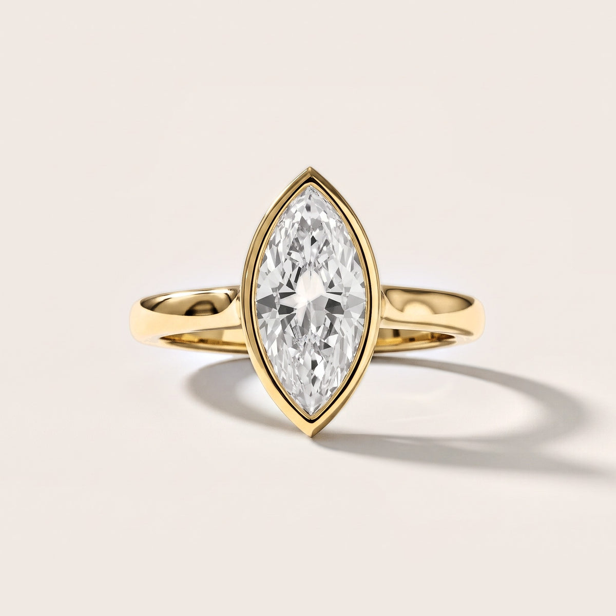 Jolie Bezel Solitaire Marquise Diamond Engagement Ring in Yellow Gold [studio-metal-20261024]