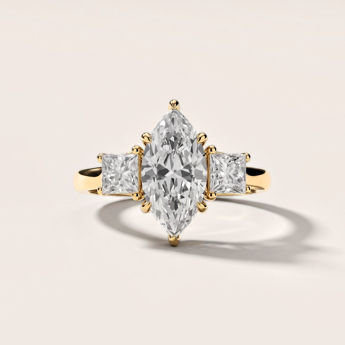 Sienna Three-Stone Marquise Diamond Engagement Ring in Yellow Gold [studio-metal-20261024]