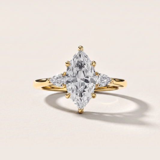 Leila Three-Stone Marquise Diamond Engagement Ring in Yellow Gold [studio-metal-20261024]