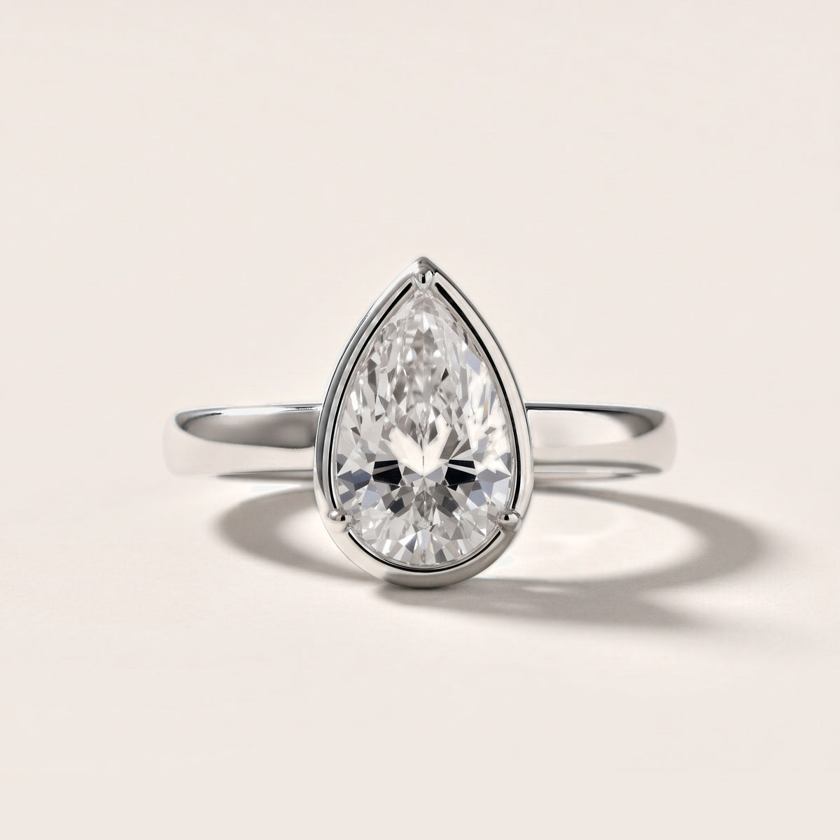 Alina Bezel Solitaire Pear Diamond Engagement Ring in Platinum [studio-metal-20261024]