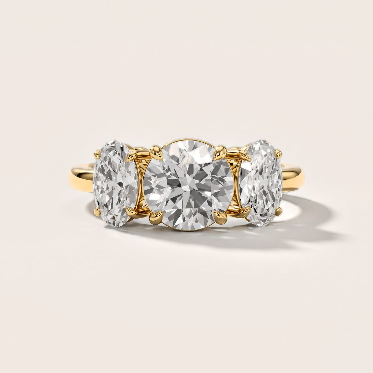 Lila Three-Stone Round Diamond Engagement Ring in Yellow Gold [studio-metal-20261024]