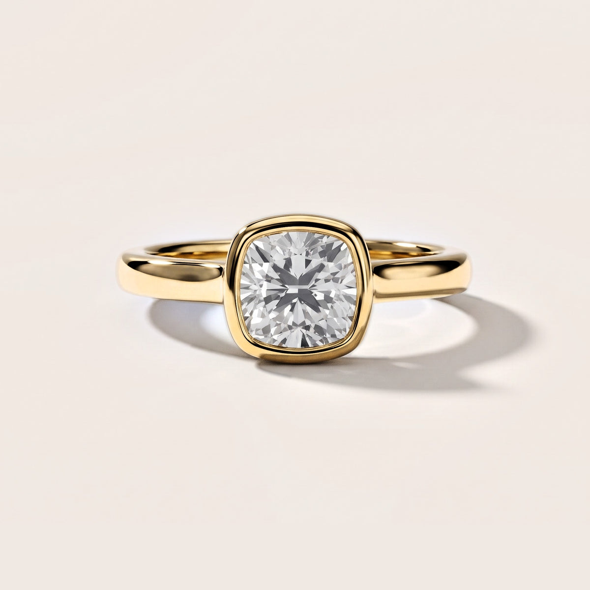 Jolie Bezel Solitaire Cushion Diamond Engagement Ring in Yellow Gold [studio-metal-20261024]