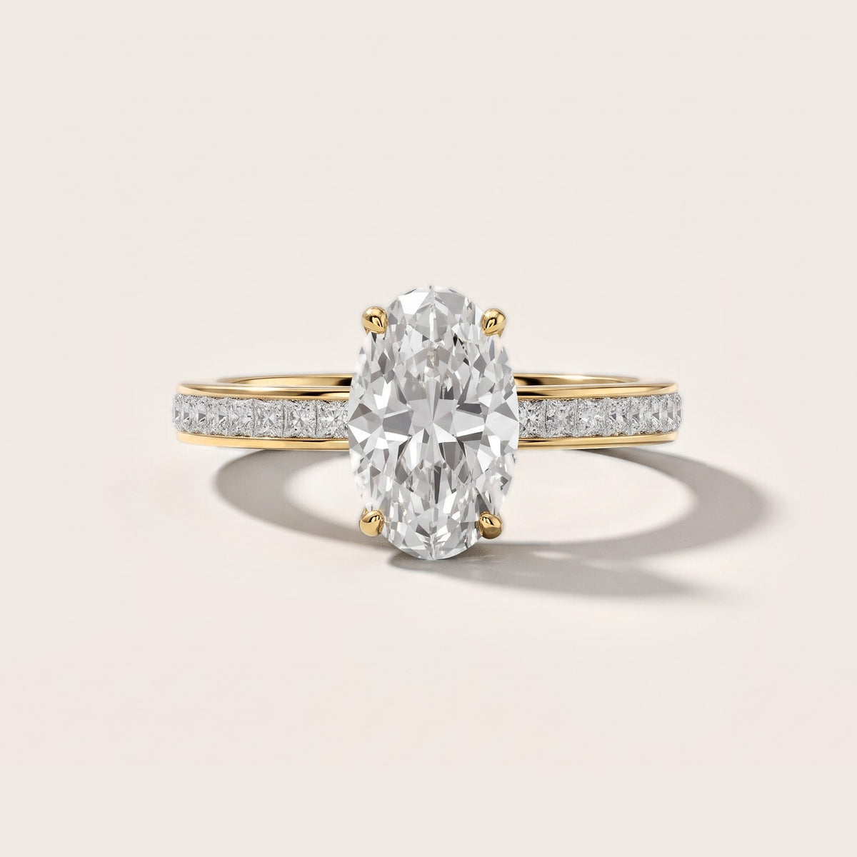 Brielle Channel Set Solitaire Oval Diamond Engagement Ring in Yellow Gold [studio-metal-20261024]