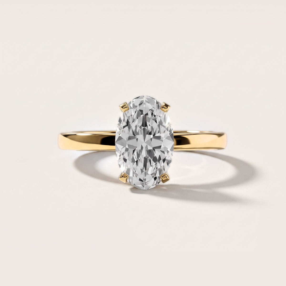 Liana Solitaire Claw Prong Oval Diamond Engagement Ring in Yellow Gold [studio-metal-20261024]