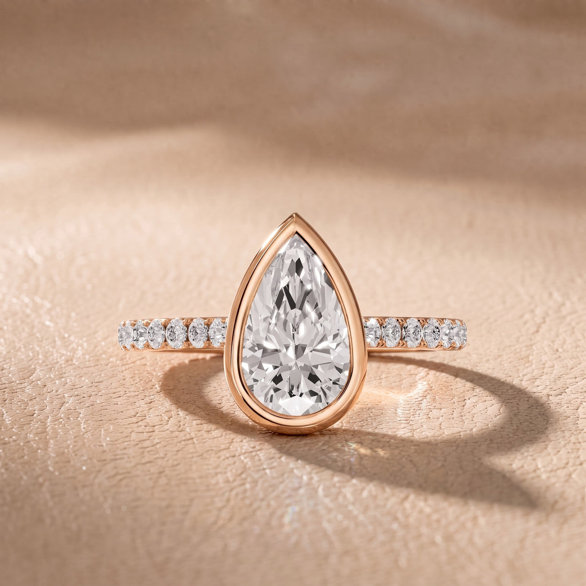 Cora Bezel Pavé Pear Diamond Engagement Ring in Rose Gold - front.jpg