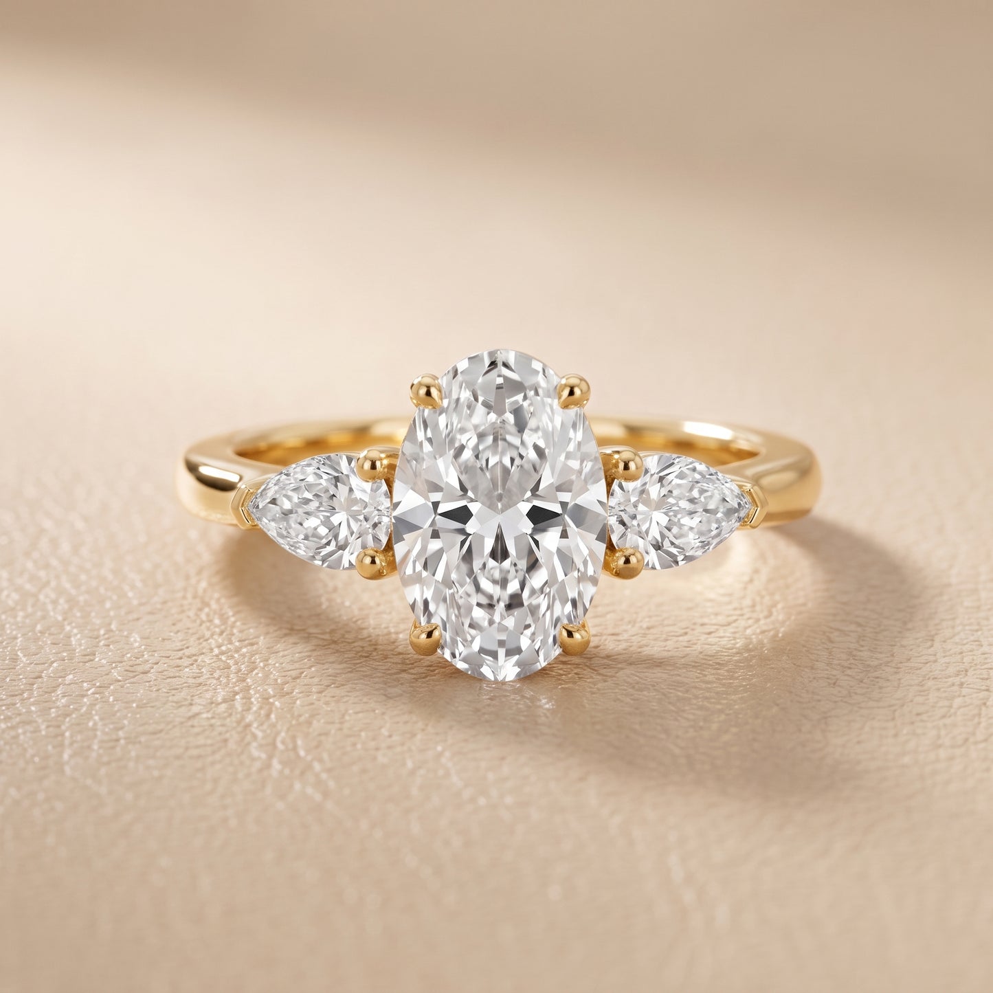 Mirabel Three-Stone Oval Diamond Engagement Ring in Yellow Gold - front.jpg