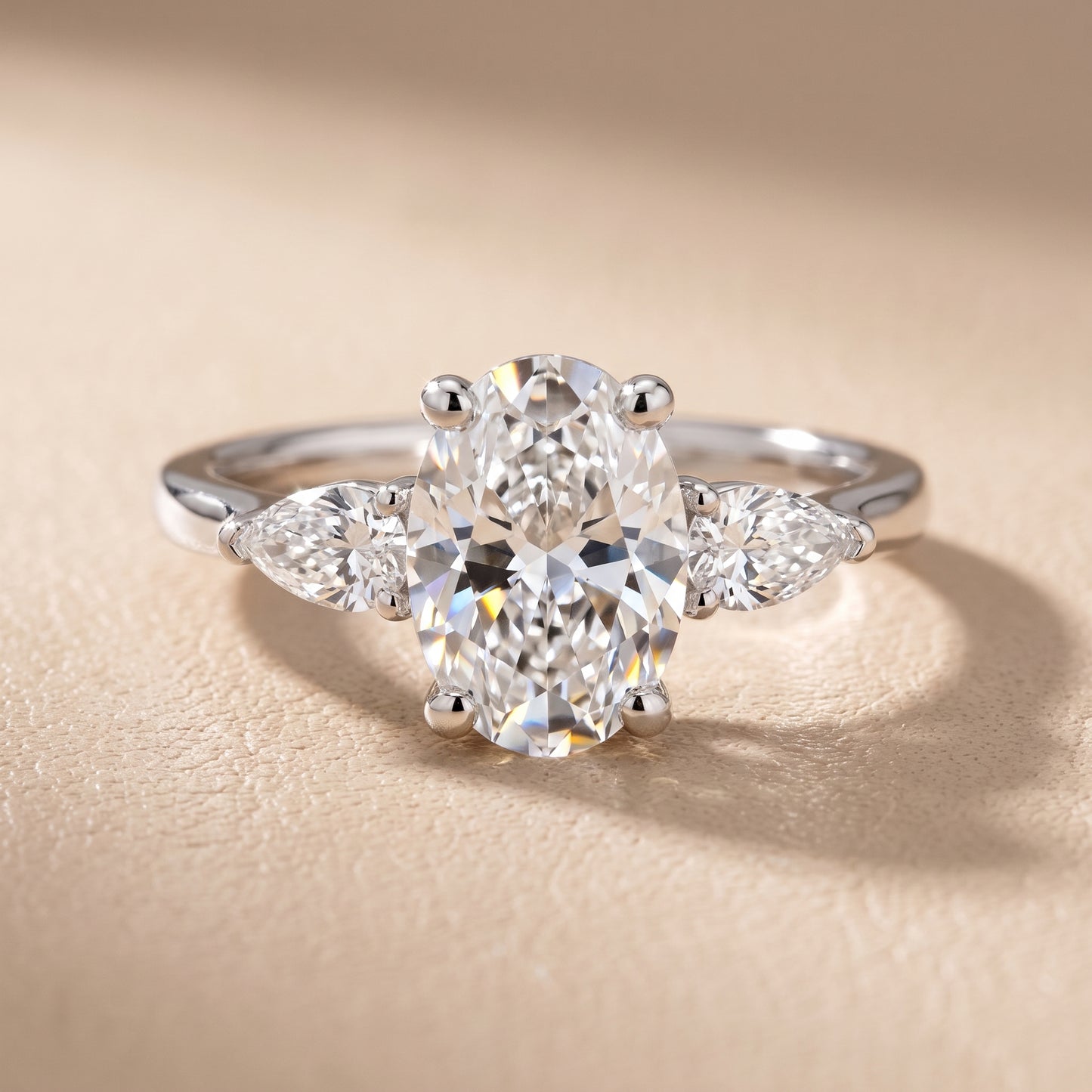 Faye Three-Stone Trellis Oval Diamond Ring in White Gold - front.jpg